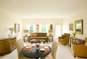 Model living room-dining room in a Welch Senior Living property