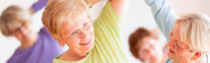 Older women stretching in an exercise class