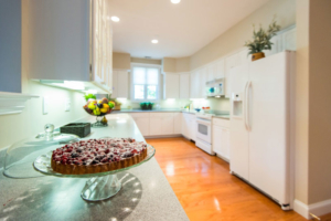 Cake plate with dessert on the kitchen counter in a Garden Home