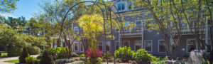 Well-manicured garden area outside a Welch Senior Living property