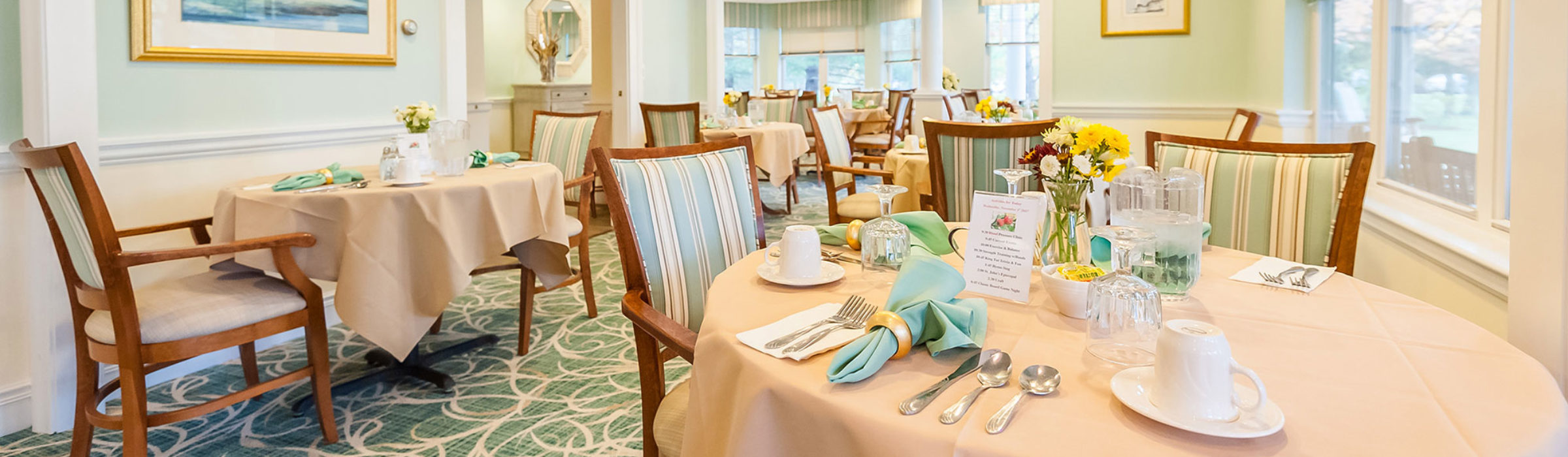 Bright dining room in a Welch Senior Living community